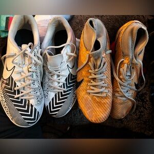 Two pairs of Nike soccer cleats.